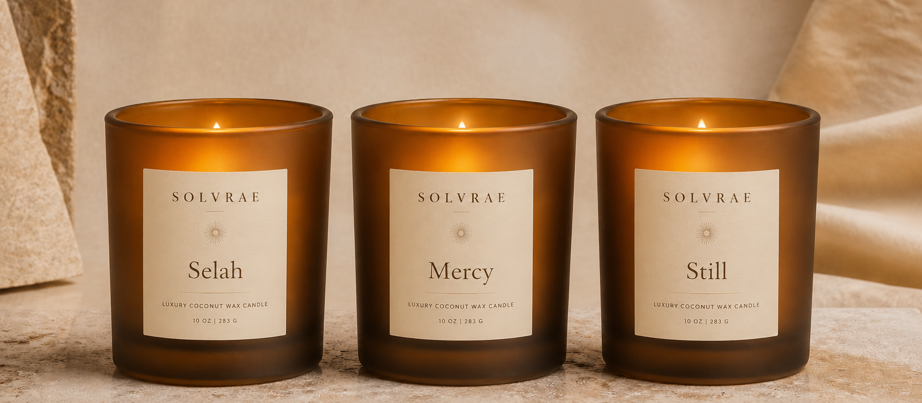 Selah, Still and Mercy candles arranged together